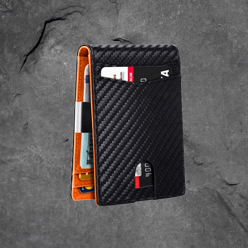 Carbon fiber patterned wallet with cards on a gray surface