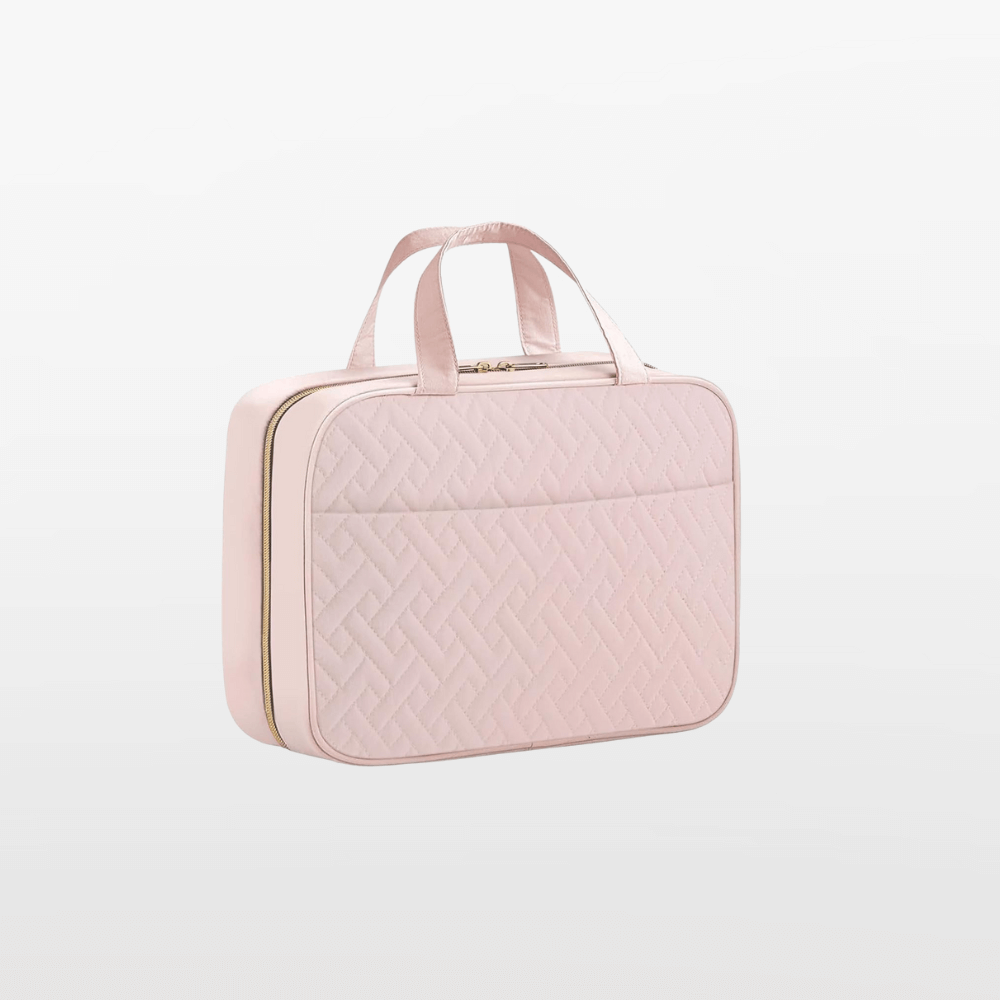 Pink quilted briefcase on a light gray background