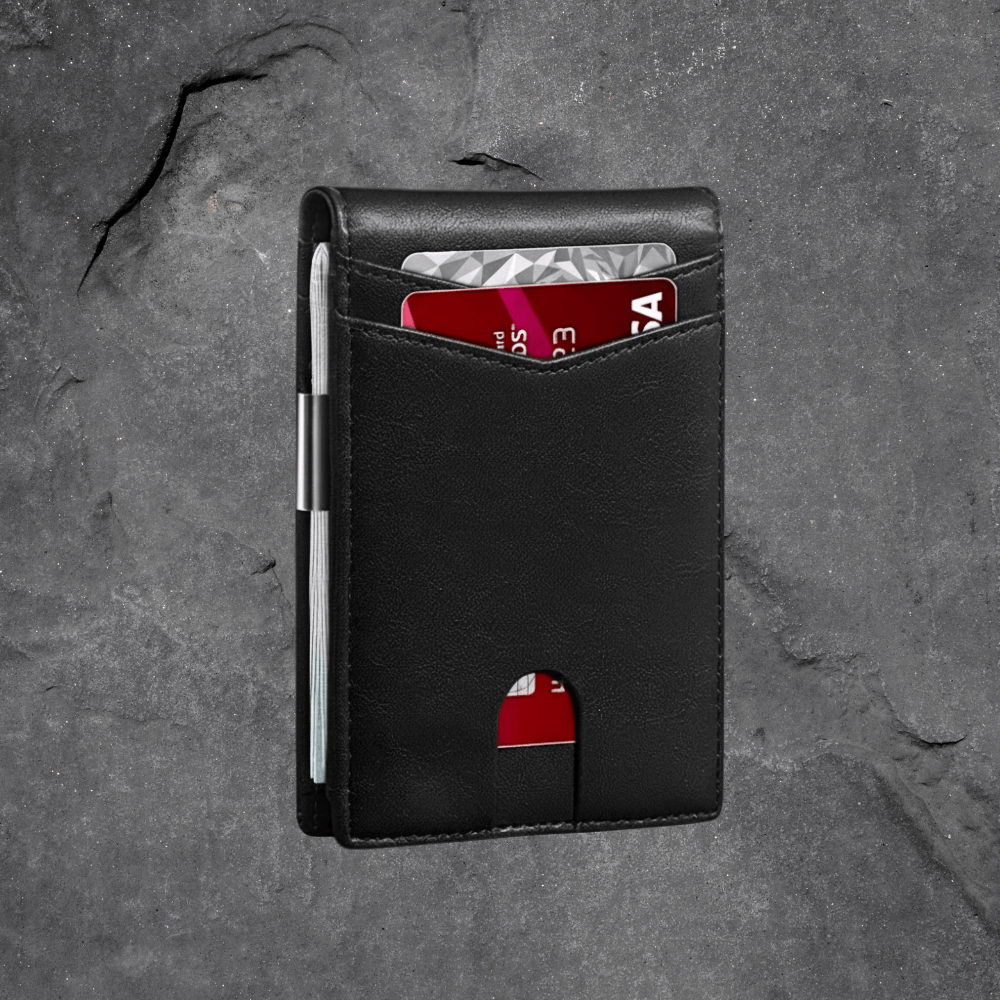 Black wallet with a card on a gray textured surface