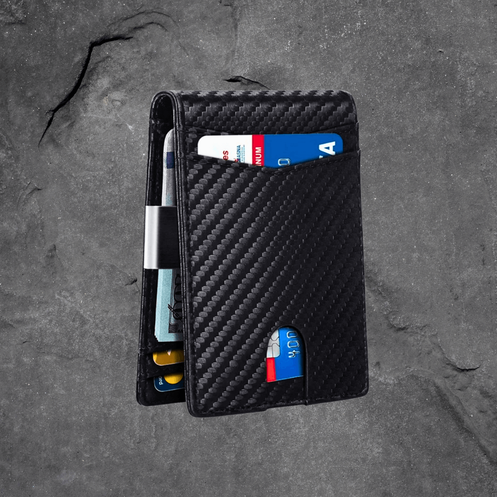 Carbon fiber wallet with cards on a gray textured background