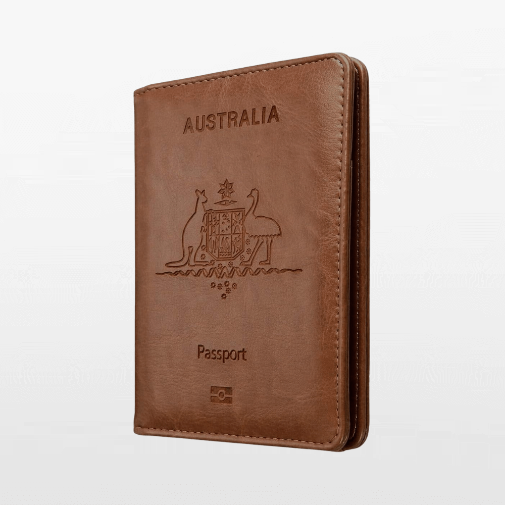 Brown leather passport holder with 'Australia' text and coat of arms on a white background