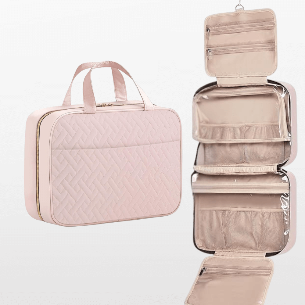 Pink travel organizer with a quilted design and a hanging compartment on a white background