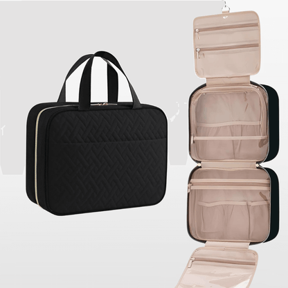 Black quilted travel bag and beige open travel organizer on a light gray background