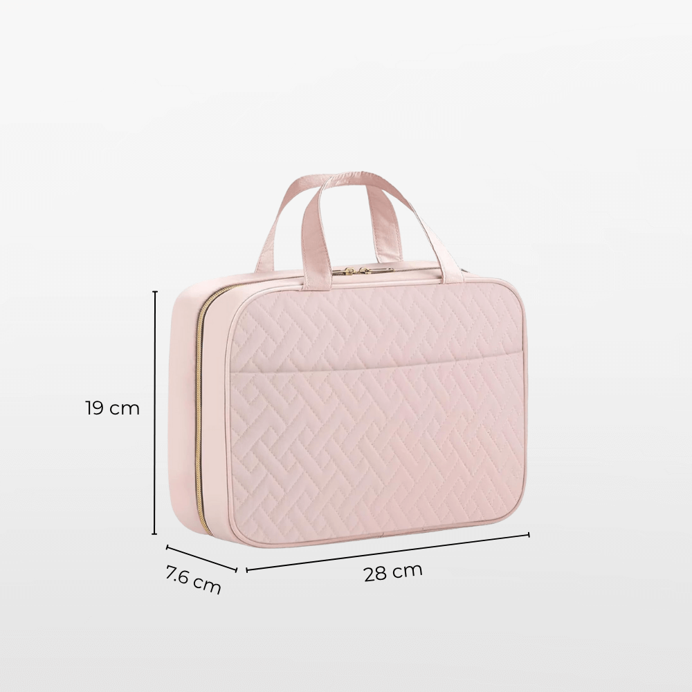 Pink quilted travel bag with dimensions on a white background