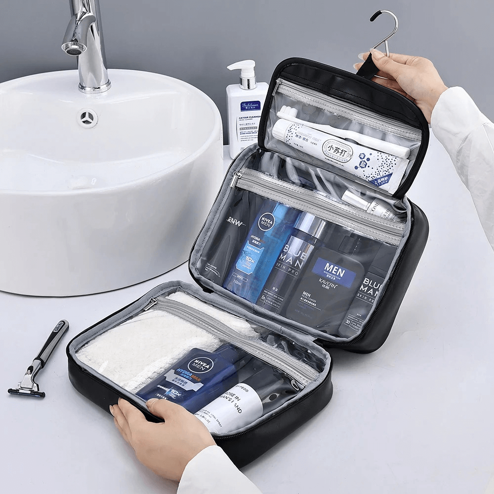 Open travel toiletry bag with Nivea products next to a sink