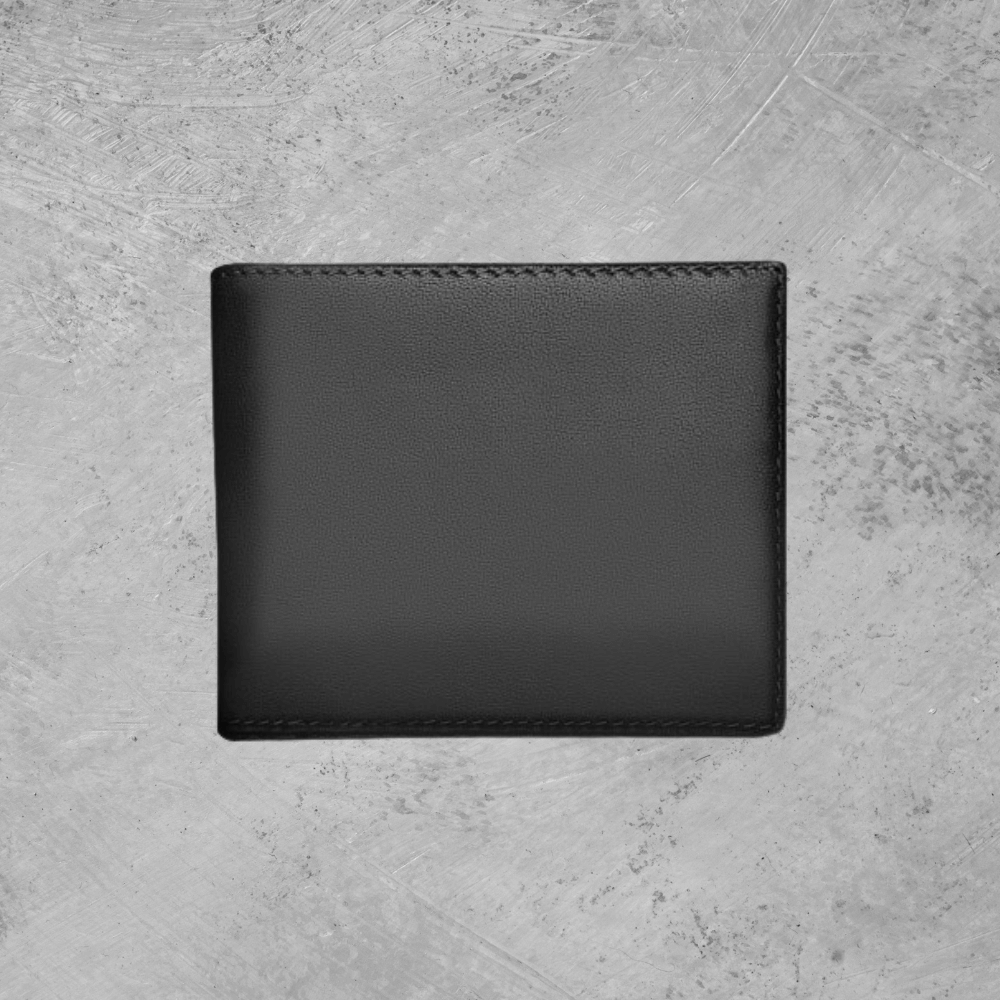 Black leather wallet on a gray concrete surface