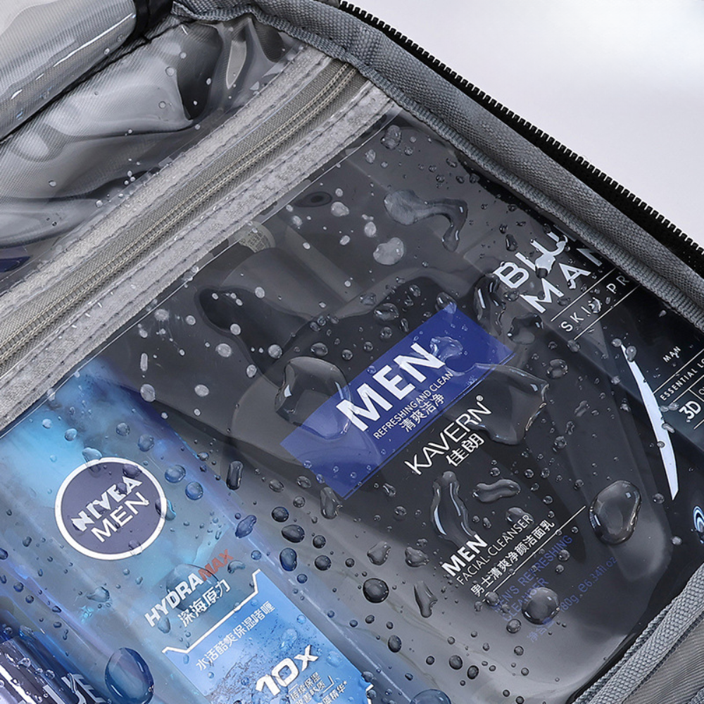 Men's skincare products with water droplets on a gray background