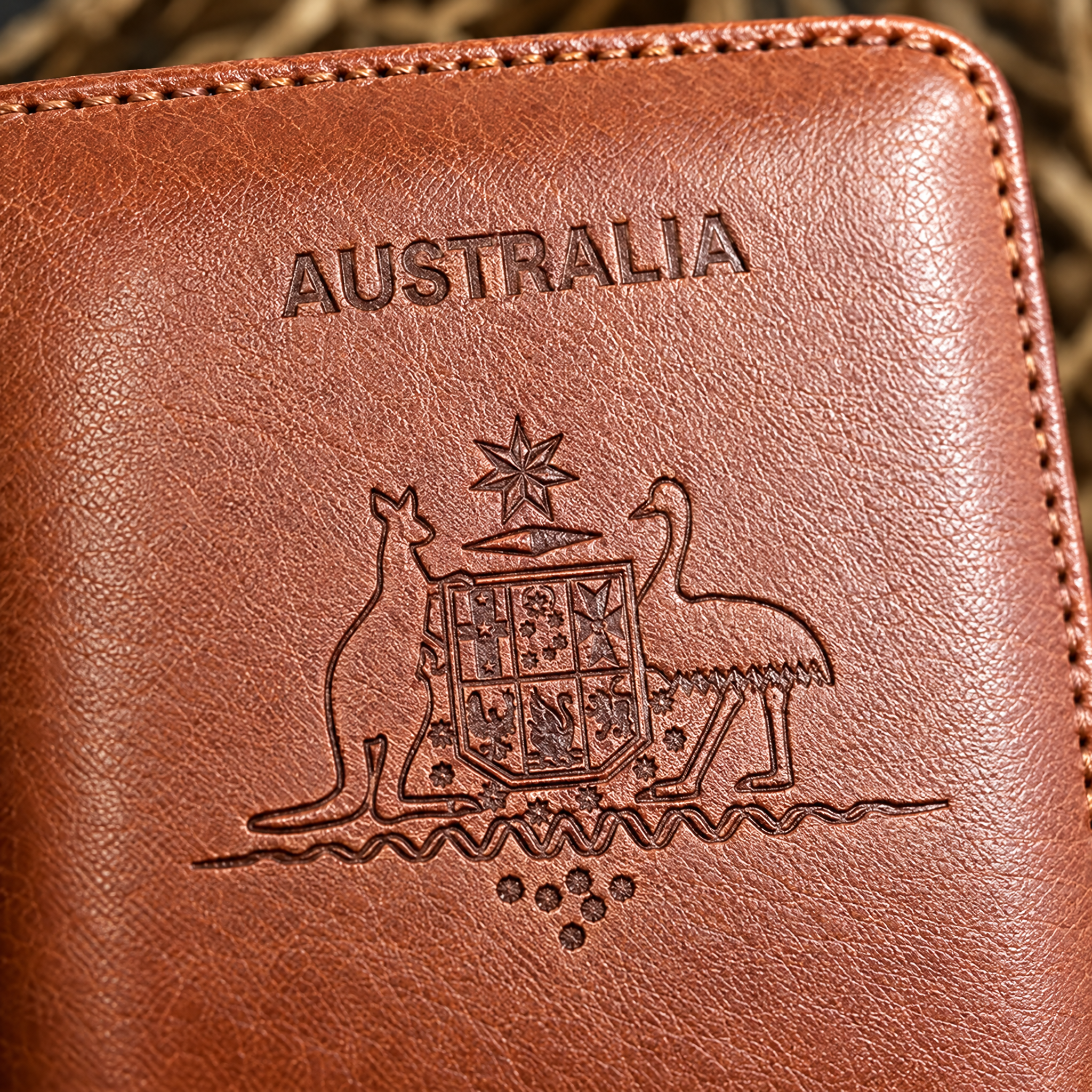 Close-up of the Australian Great Seal embossing on the brown TravelSmart RFID passport wallet